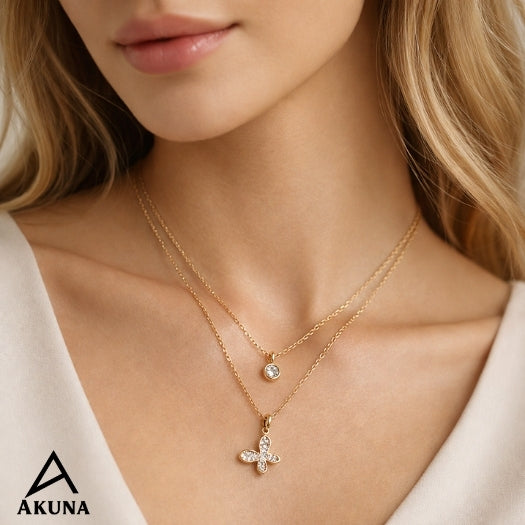 Akuna Dual-Layer Necklace in Gold-Plated Stainless Steel | Diamond Accent Pendant + Studded Butterfly Charms